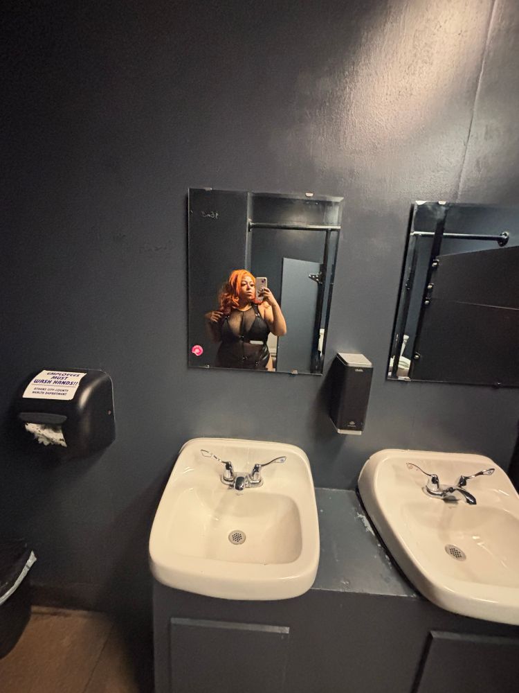Bianca (as Roxy) is pictured in a bathroom selfie
