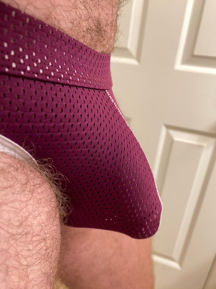 A closeup of my bulge in a mesh maroon jockstrap