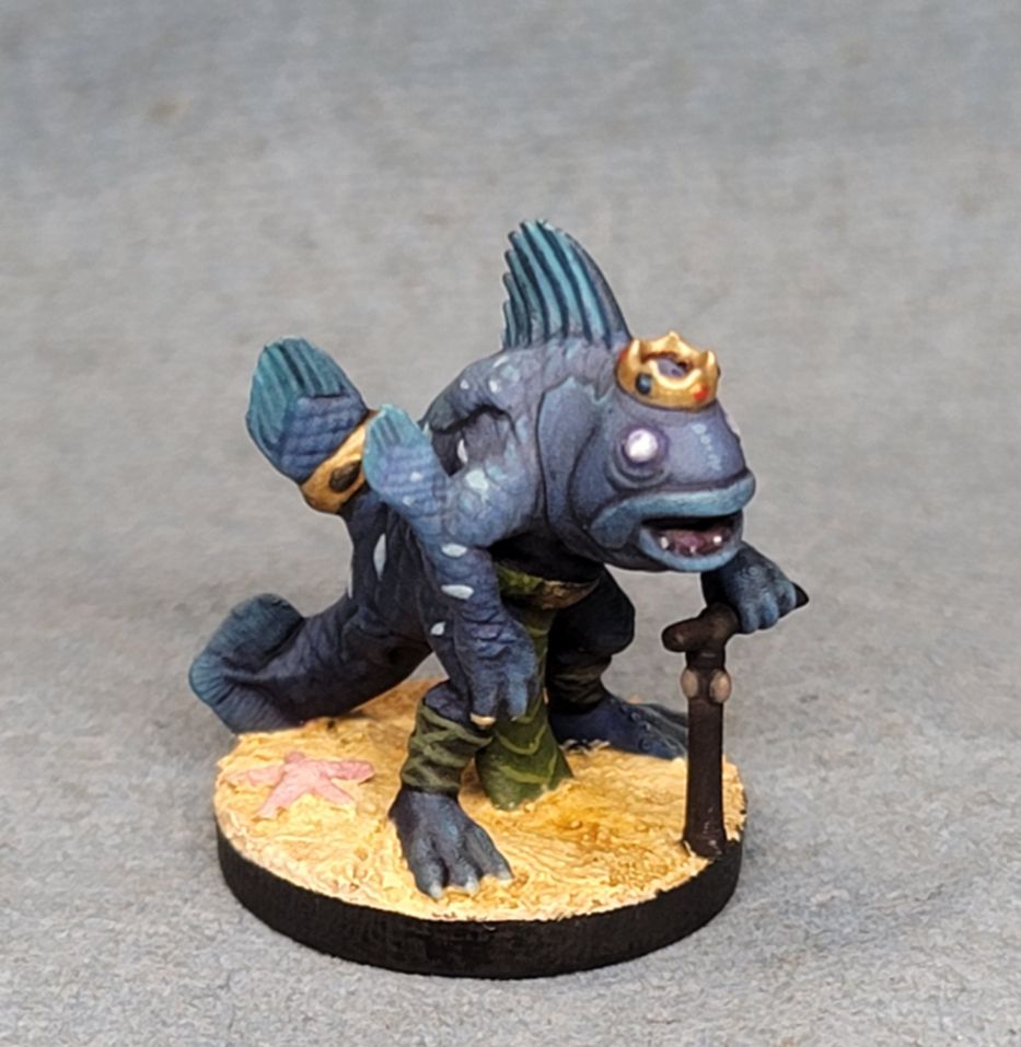 A painted, 3D printed figure of an anthropomorphic coelacanth, a type of ocean fish