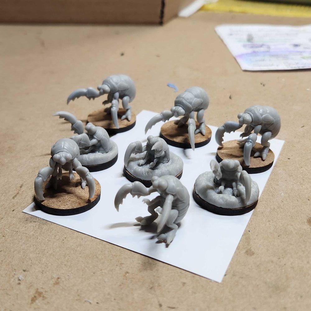 A group of assembled cicada nymph beast miniatures