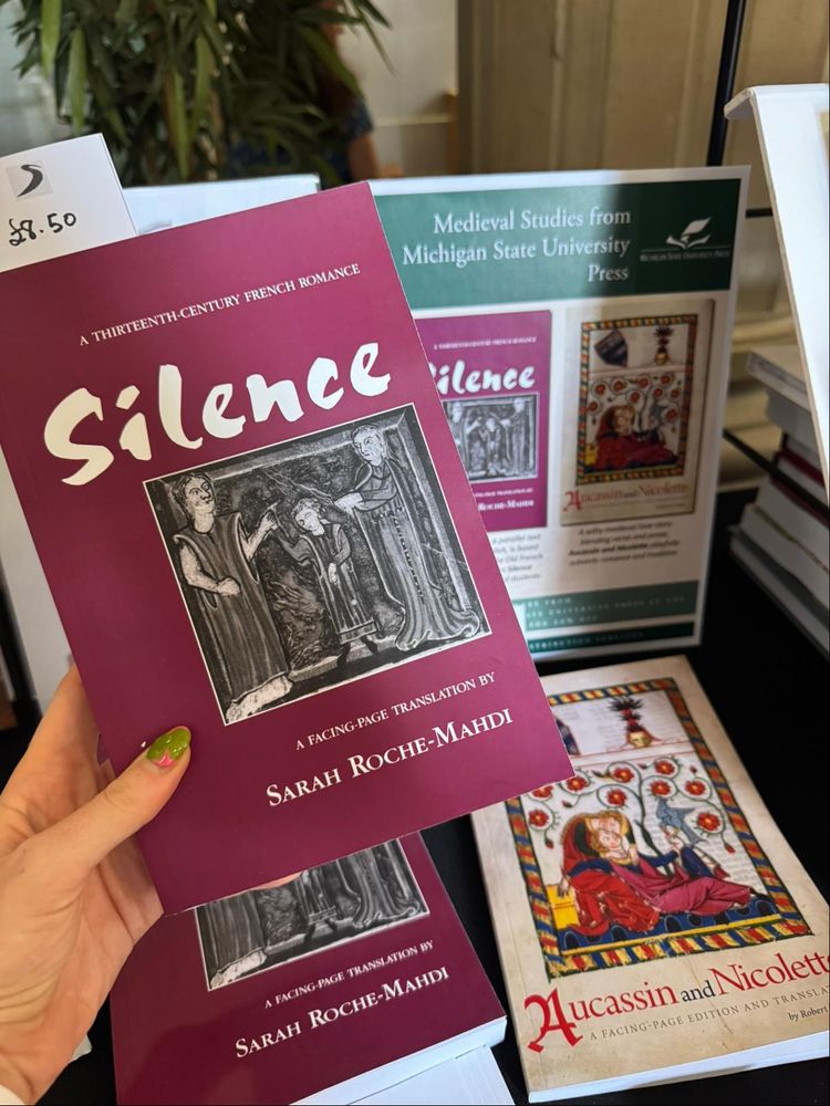 Two Medieval Studies books from Michigan State University Press, 'Silence' and 'Aucassin and Nicolette'. 