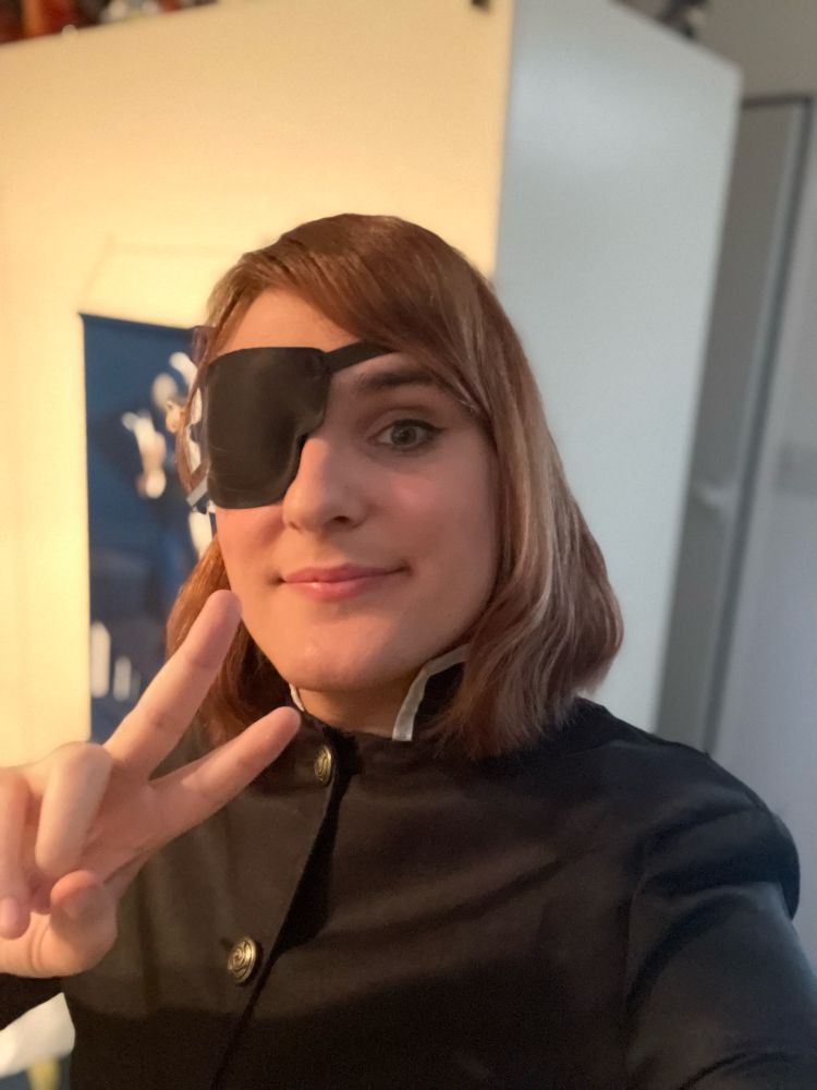 Bluesky user KindredTea dresses up as Nobara Kugisaki from Jujutsu Kaisen for Halloween.