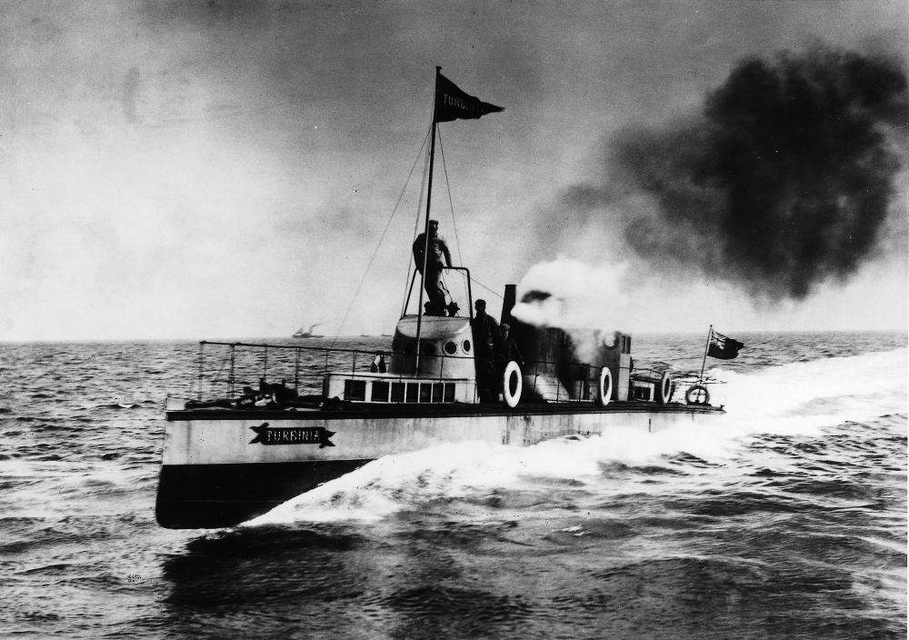 Turbinia, the first successful steam turbine vessel, casually tooling about at full chat. It's unbelievable gorgeous, and still somehow looks like the future. Notice the casual attitude of (I think) Charles Parsons up top.