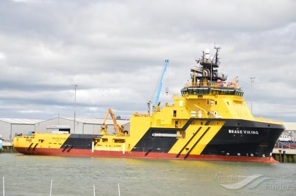 Brage Viking, an anchor handling tug painted in bright yellow and black stripes. It's a properly meaty beast of a boat, ice-capable and hugely imposing. It's currently hanging around one of the ships from the recent collision outside the Humber.
