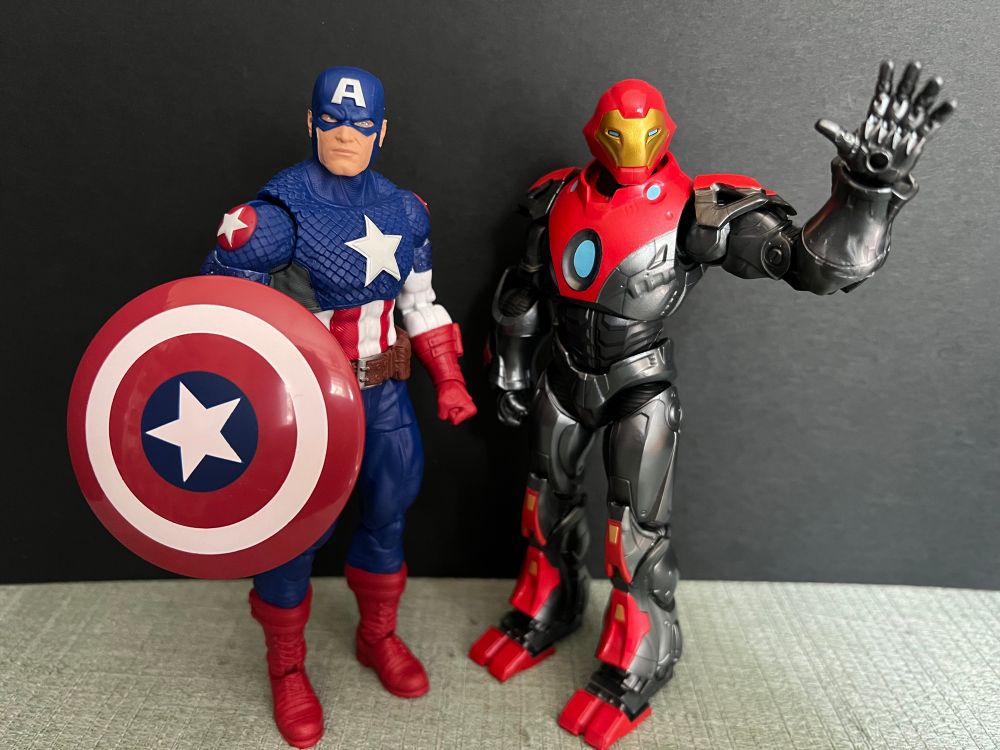 Marvel legends action figures of Ultimate Captain America on the left and Ultimate Iron Man on the right. 