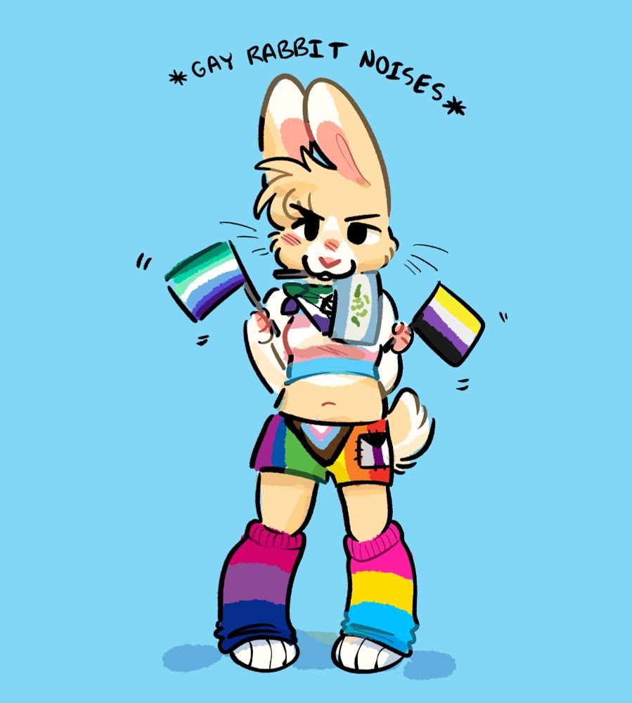 My rabbit sona Bunny standing against a blue background with *gay rabbit noises* written over their head. They are waving the gay men flag and the nonbinary flag, holding the achillean flag in their mouth, wearing a therian flag bandana, wearing a trans flag crop top, wearing progress flag shorts with a demisexual patch on them, wearing one bisexual leg warmer and wearing one pansexual leg warmer. They look determined and a little silly. VIVA LA PRIDE