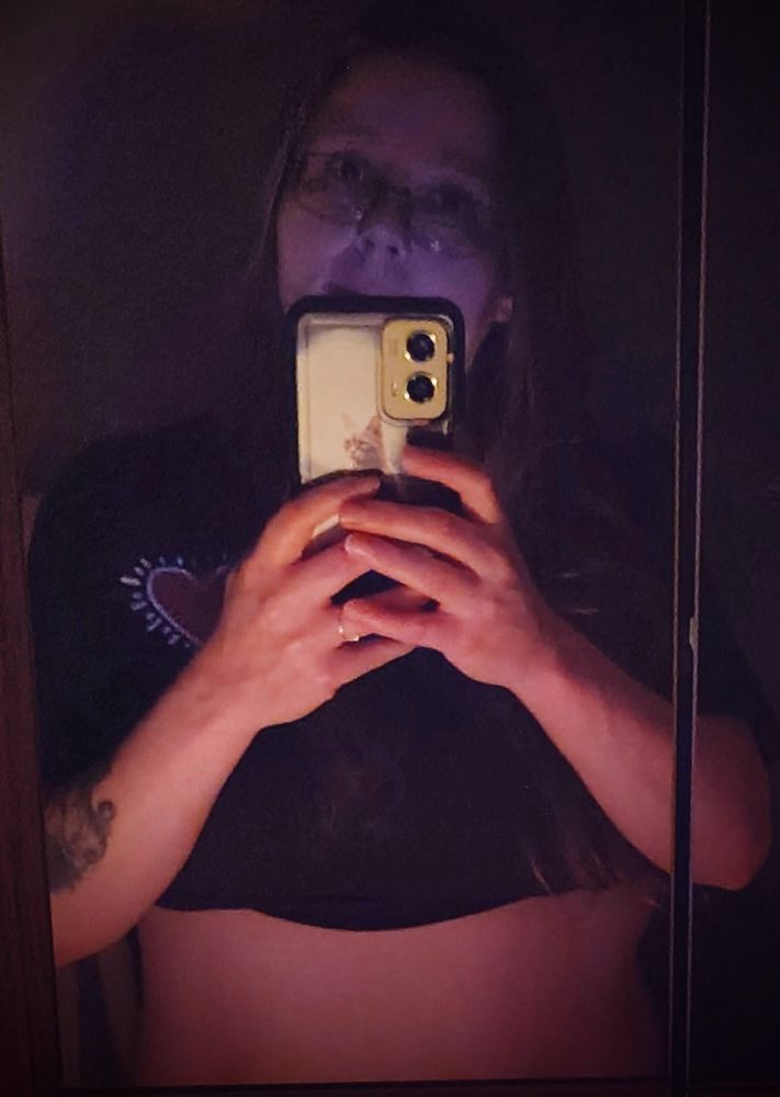 A mirror selfie exposing my stomach 