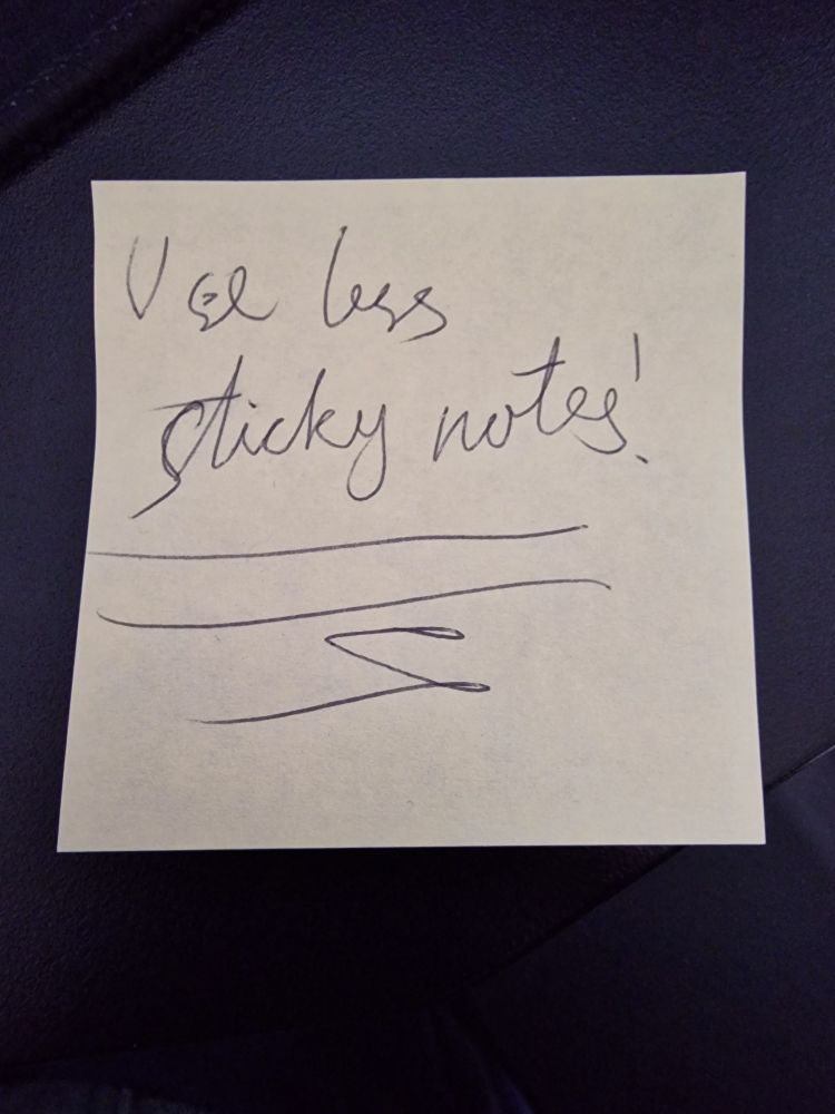 A sticky note that says "use less sticky notes"
