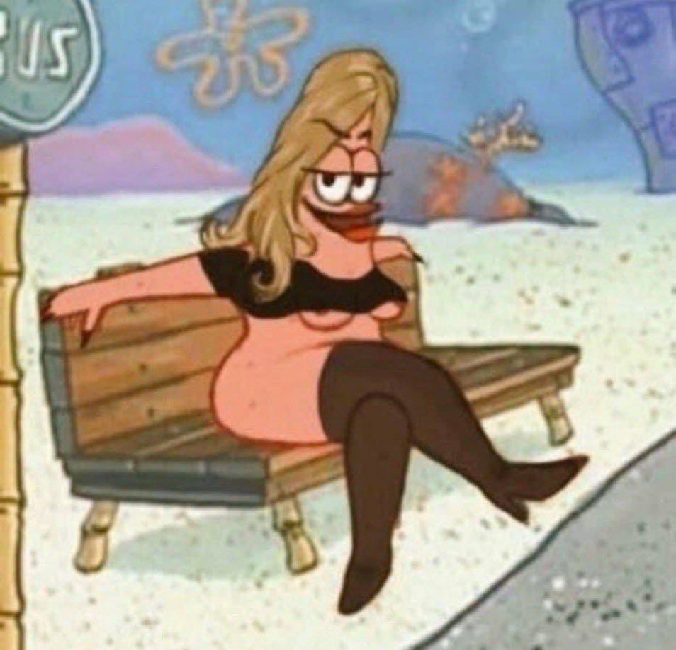 Edit of Patrick looking seductively in a crop top and stockings and long hair