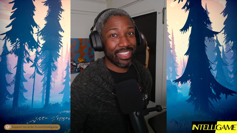 Josh, a black man with short cut salt-and-pepper hair, wearing a black hoodie and t-shirt smiling at the camera.
