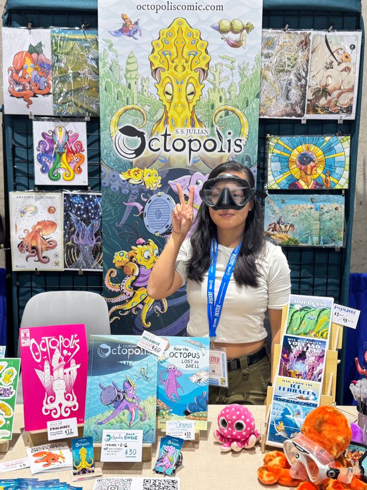A photo of the SDCC 2025 Octopolis Booth!
A scuba diver gives the peace sign