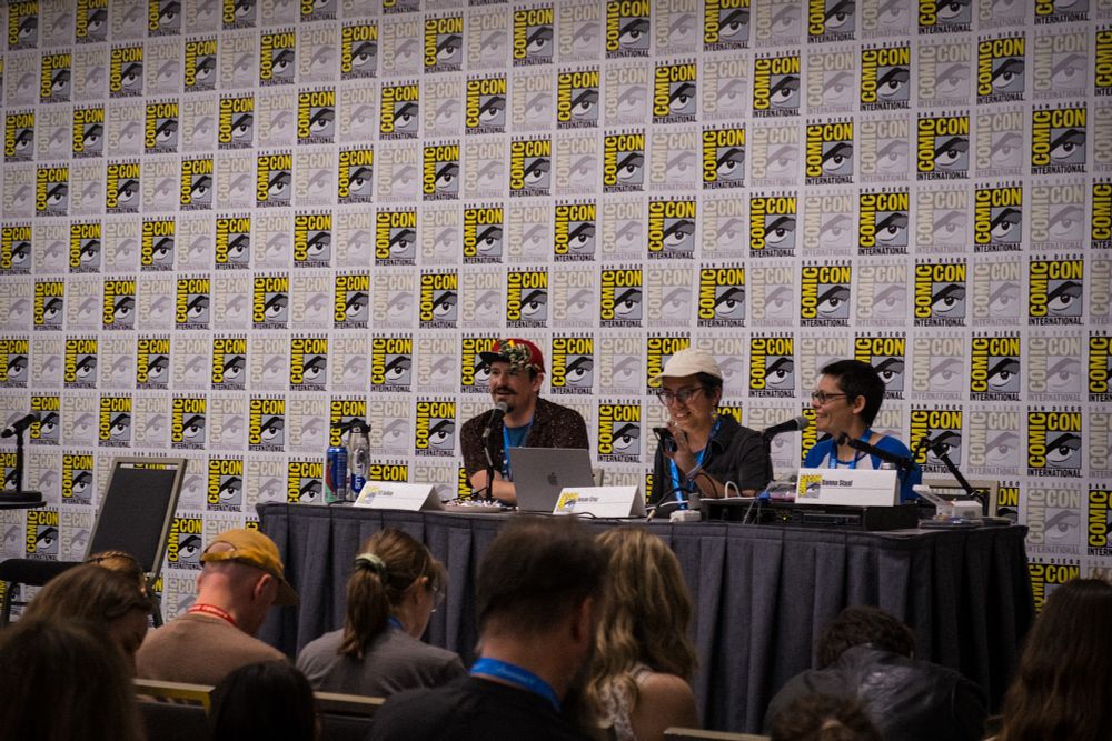 A photo of SS Julian, Josie Cruz and Danna Staaf on a panel at San Diego Comic-con 2025 
