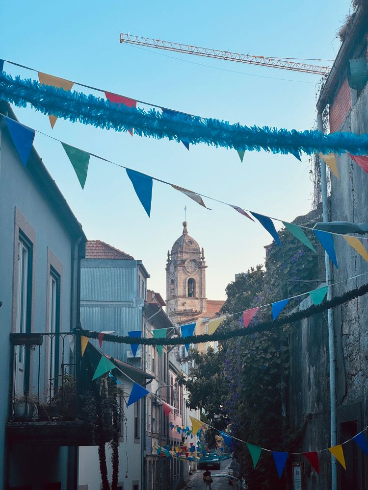 A church seen through the distance of a corridor in Porto