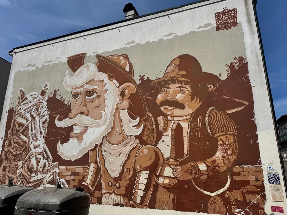 A cartoon mural of Don Quixote and Pancho
