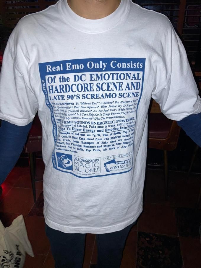 A t-shirt with the Real Emo Copypasta on it in the style of the Dr. Bronner’s soap label. 