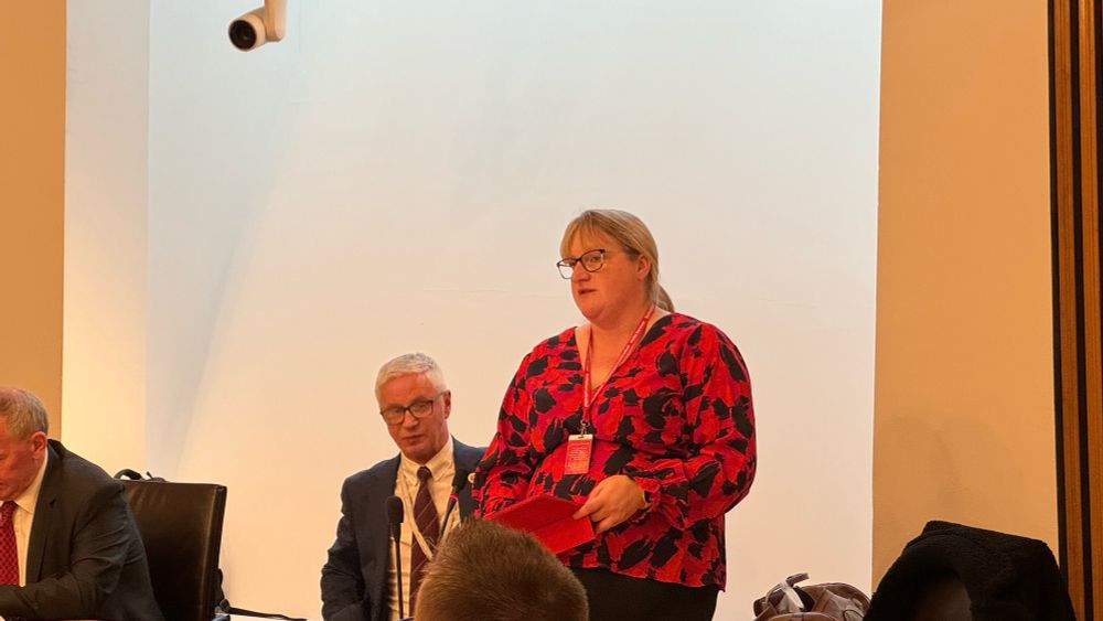 Donna speaking from the top table