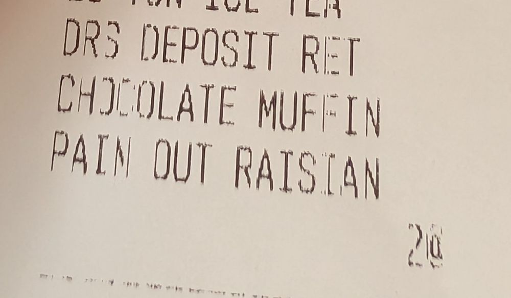 Extrait d'un ticket de caisse.
Pain au raisin est écrit de façon phonétique "Pain out raisian"