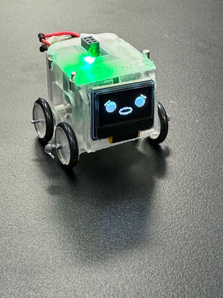 Mini robot displaying a suprised expression.