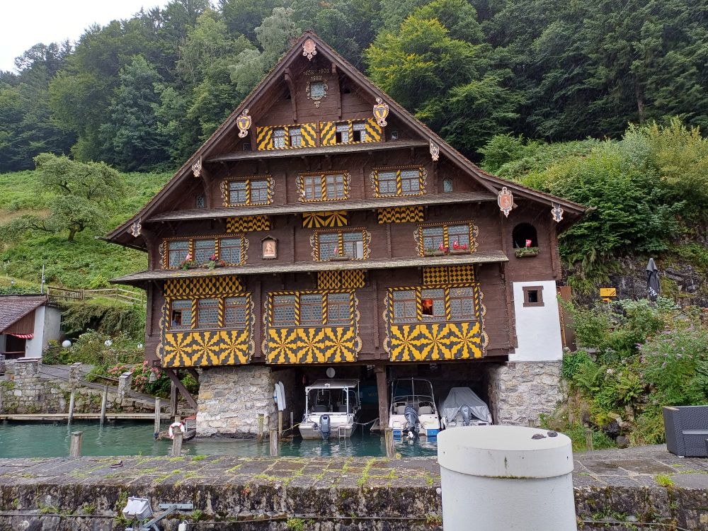 An old traditional building at a lake in Switzerland.