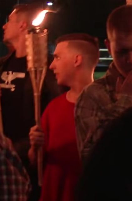 Noah Thomas Gunter carrying a torch at UTR