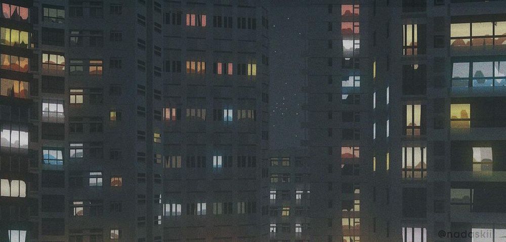 illustration of the same buildings at night.