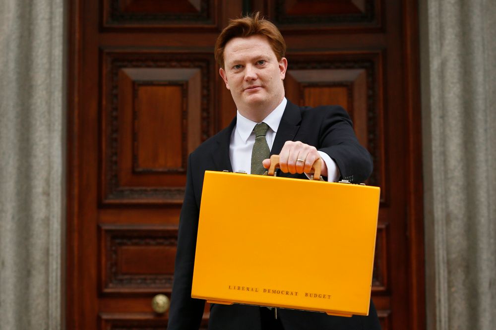 Danny Alexander holds a burger cheese slice