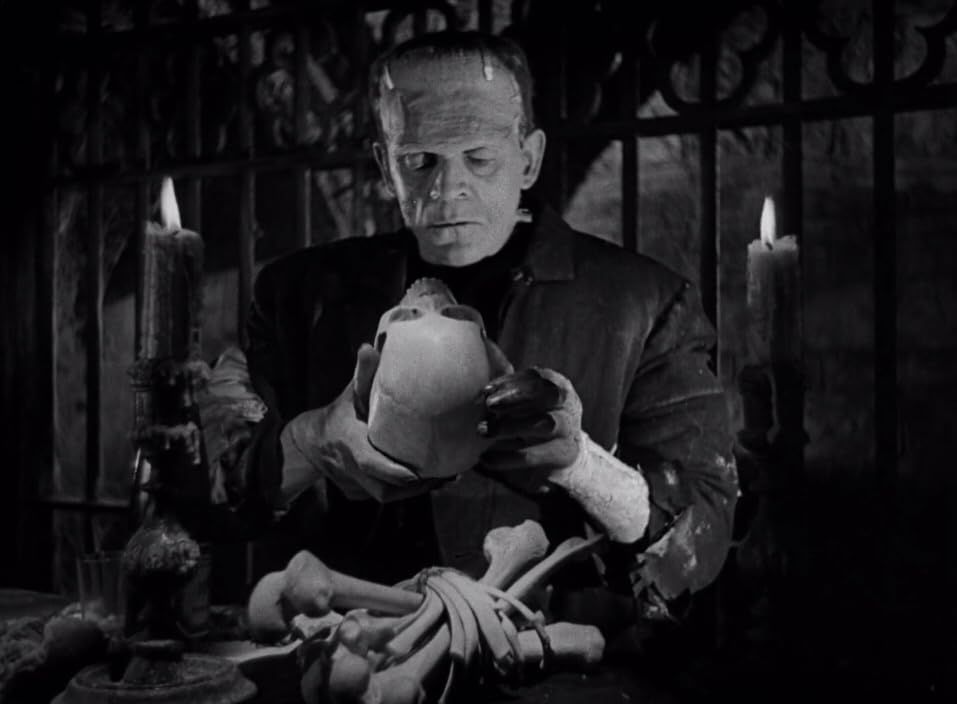 The Monster examining a skull, The Bride of Frankenstein (1935)
