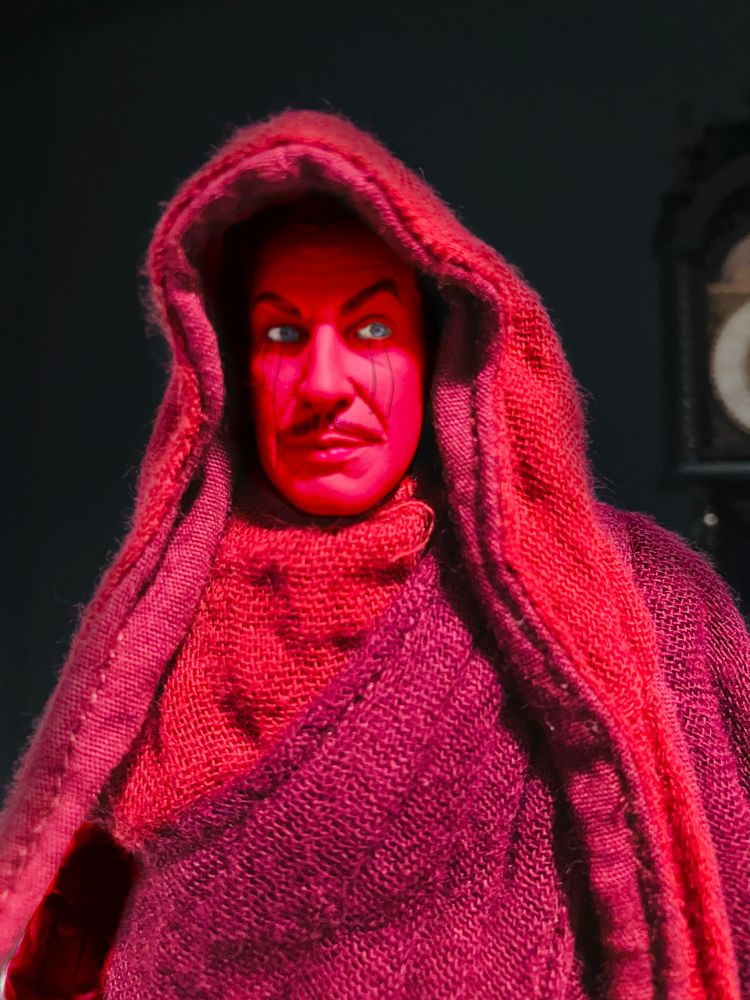 NECA Vincent Price figure wearing the robes of Four Horsemen's Red Death, recolored to resemble the Man in Red from The Masque of the Red Death (1964)