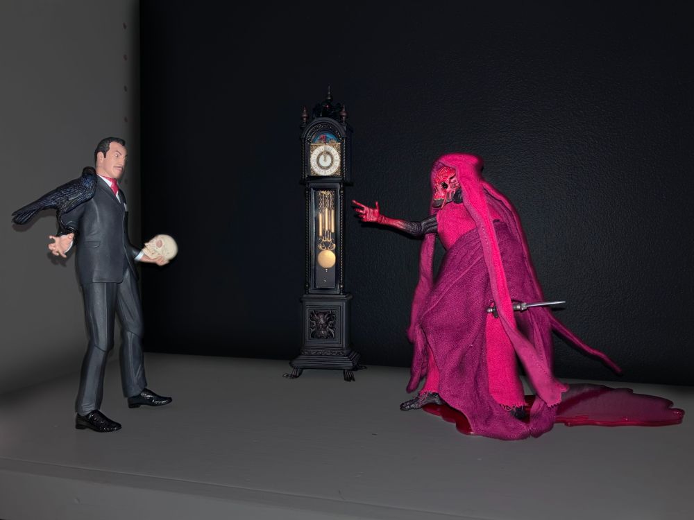 NECA's Vincent Price figure posed with Four Horsemen's Red Death