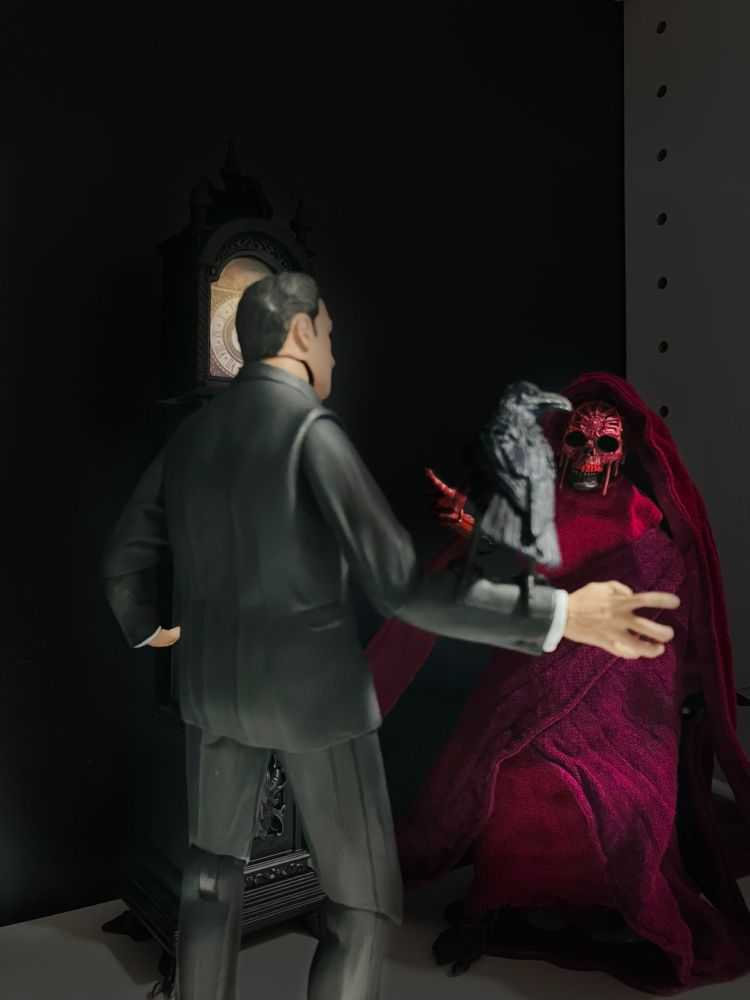 NECA's Vincent Price figure posed with Four Horsemen's Red Death