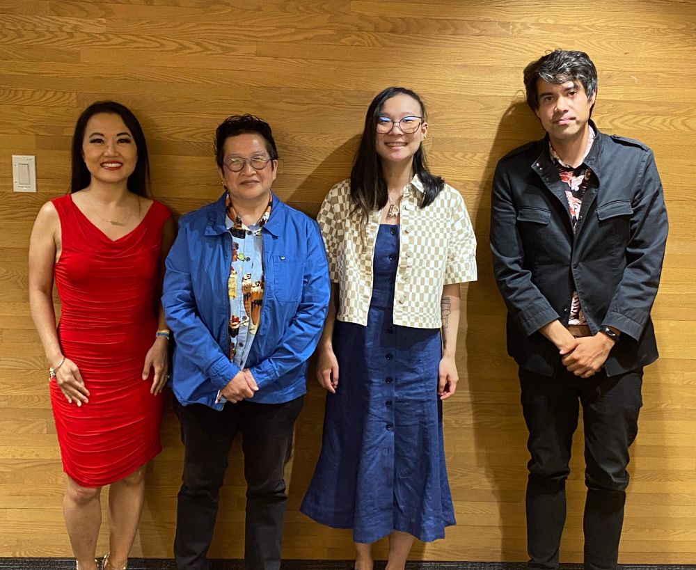 Catherine Lewis, Candie Tanaka, Isabella Wang, and Kawika Guillermo
standing in front of a wood-toned wall