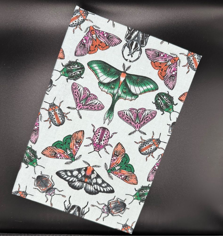 One of my favorite books. Beautifully symmetrical bugs, moths and beetles on a pale background. 