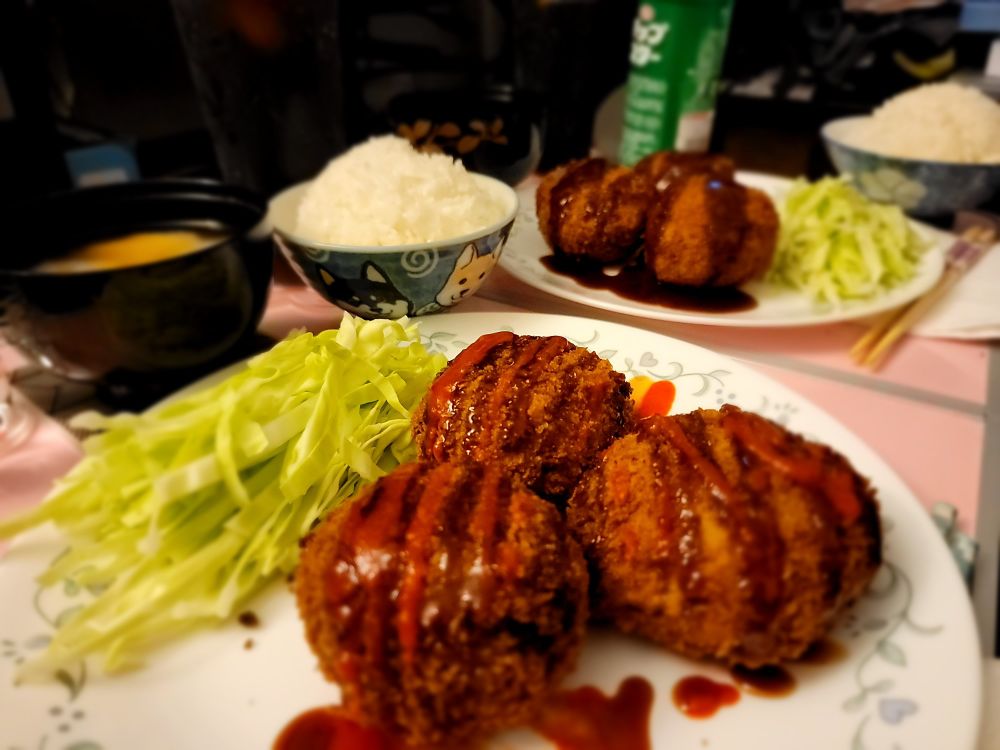Miso soup with Tofu, shredded cabbage, rice, and korokke(croquettes)

