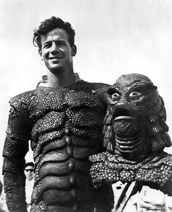 Ricou Browning, suit actor for the Gill-man, wearing the suit 