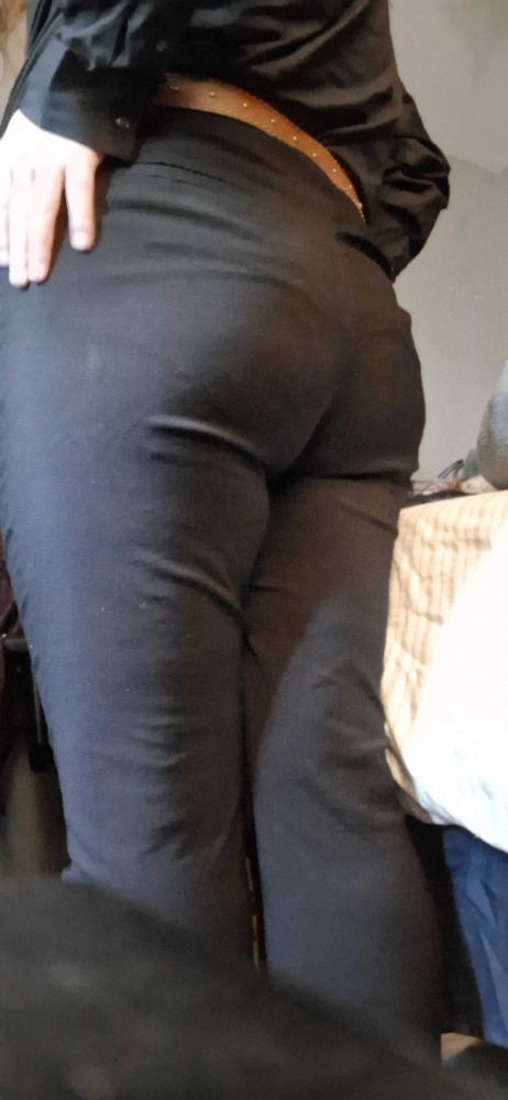 Mave's fat ass in black dress pants