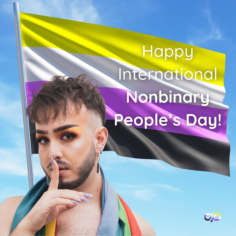 A person with strong make-up, shiny nail polish, long earrings and a hairy chest standing in front of a nonbinary flag. Overlaid text: Happy International Nonbinary People's Day!