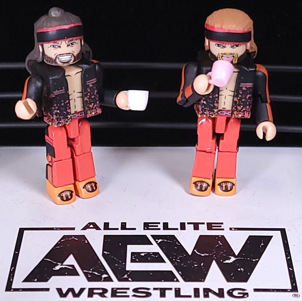 Minimates action figures: 

AEW wrestlers The Young Bucks, Matt and Nick Jackson, are standing in an AEW wrestling ring drinking from teacups.