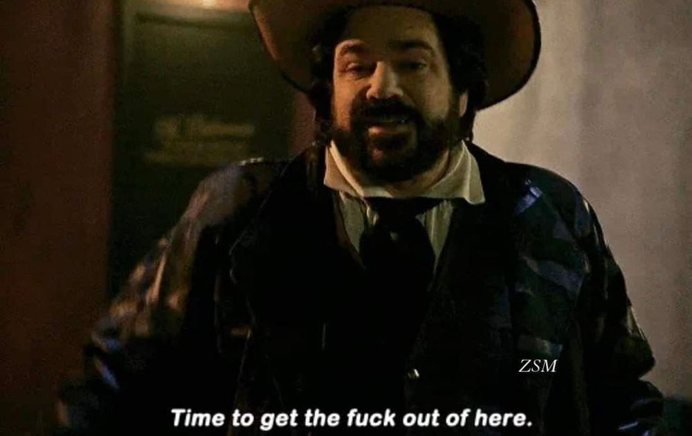 Jackie Daytona saying it’s time to get the fuck out of here in a cowboy hat and jacket 