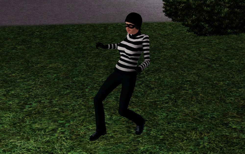 A burglar sim creeping across the lawn 