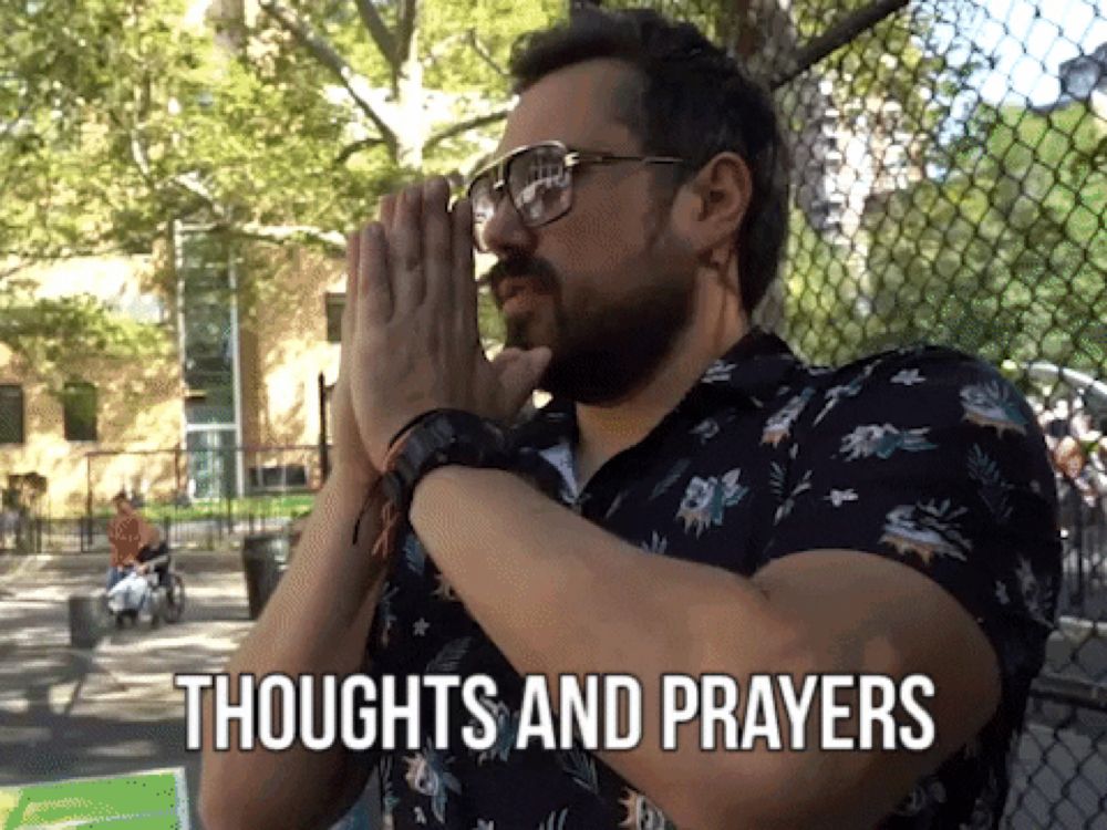 a man praying with the words " thoughts and prayers " above him