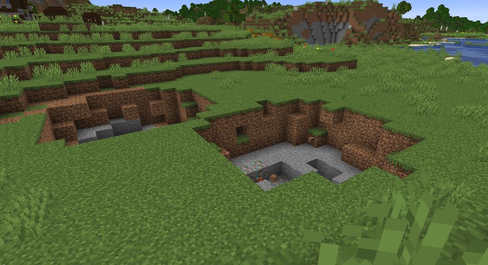 two big craters in the surface of a minecraft world created by the weight of my ginormous sack