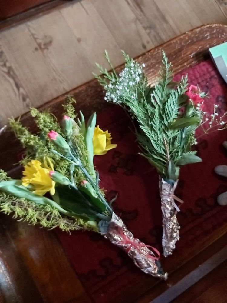Couple of posies of flowers given out during the service.
