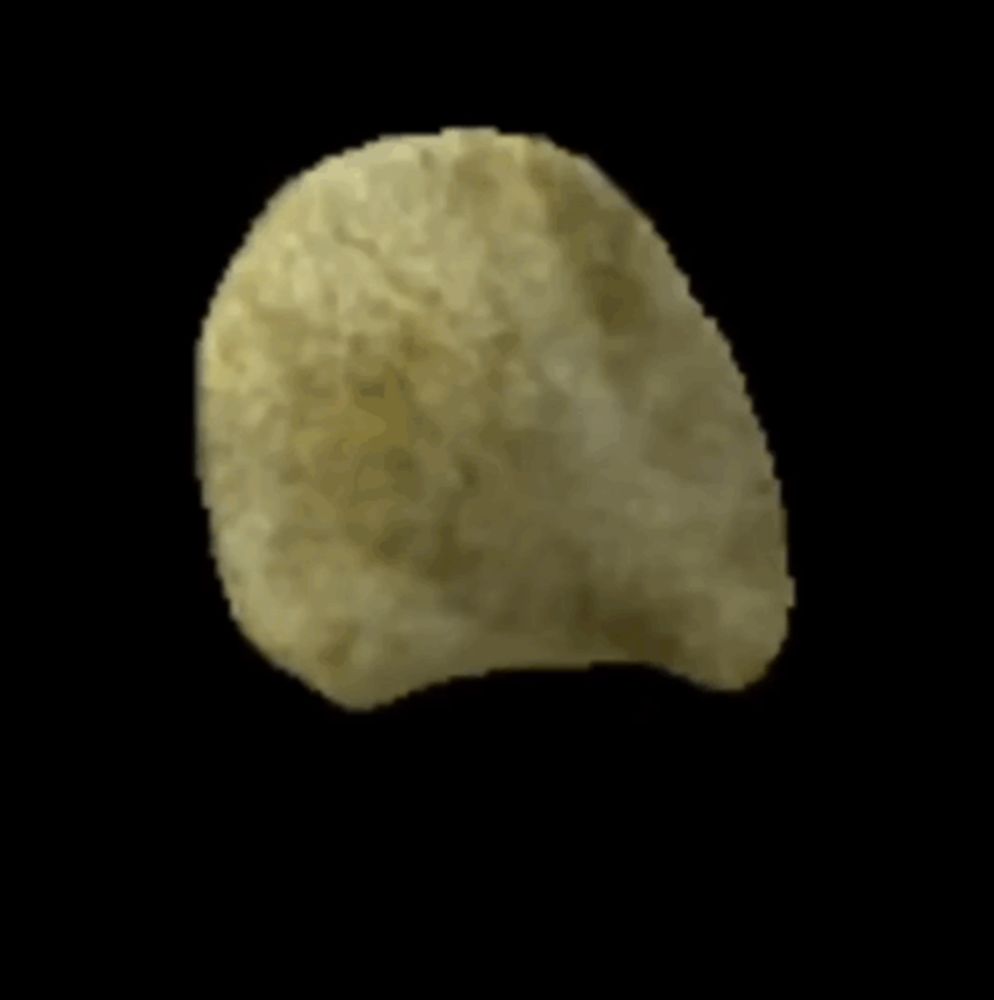 a potato chip with a bite taken out of it on a black background