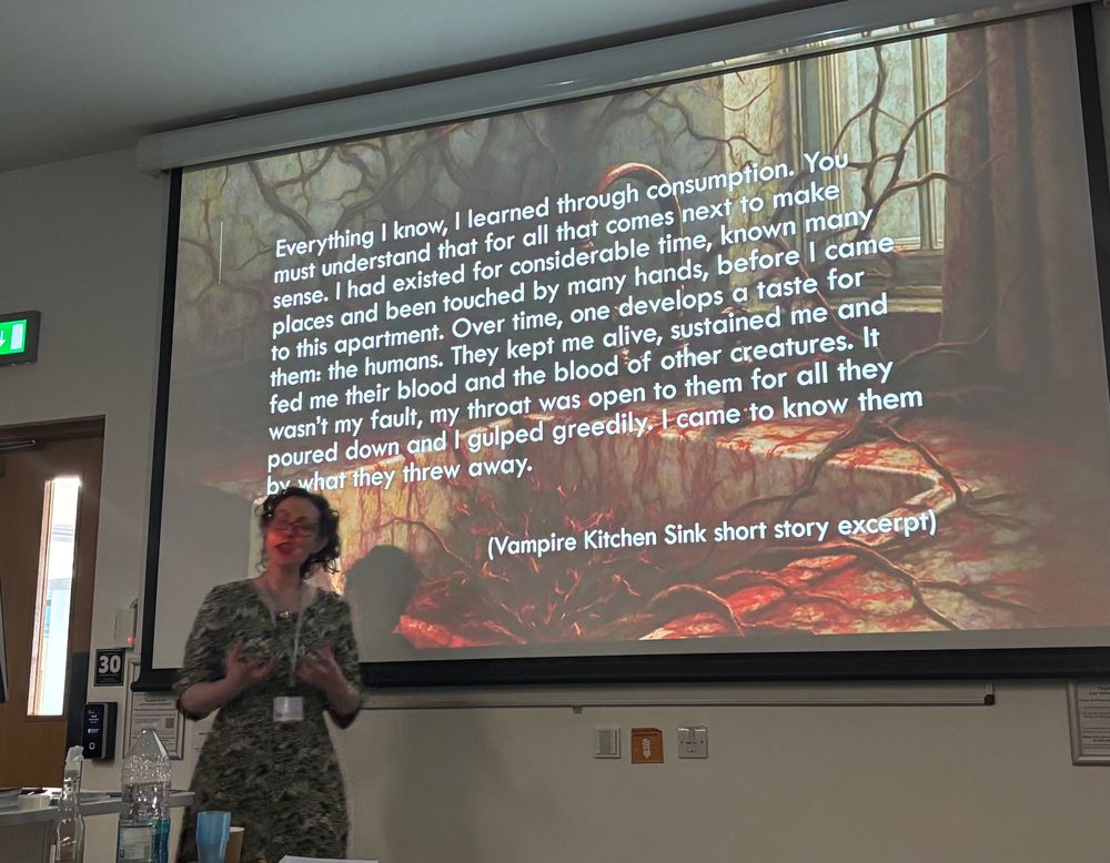 Woman giving lecture in front of screen
