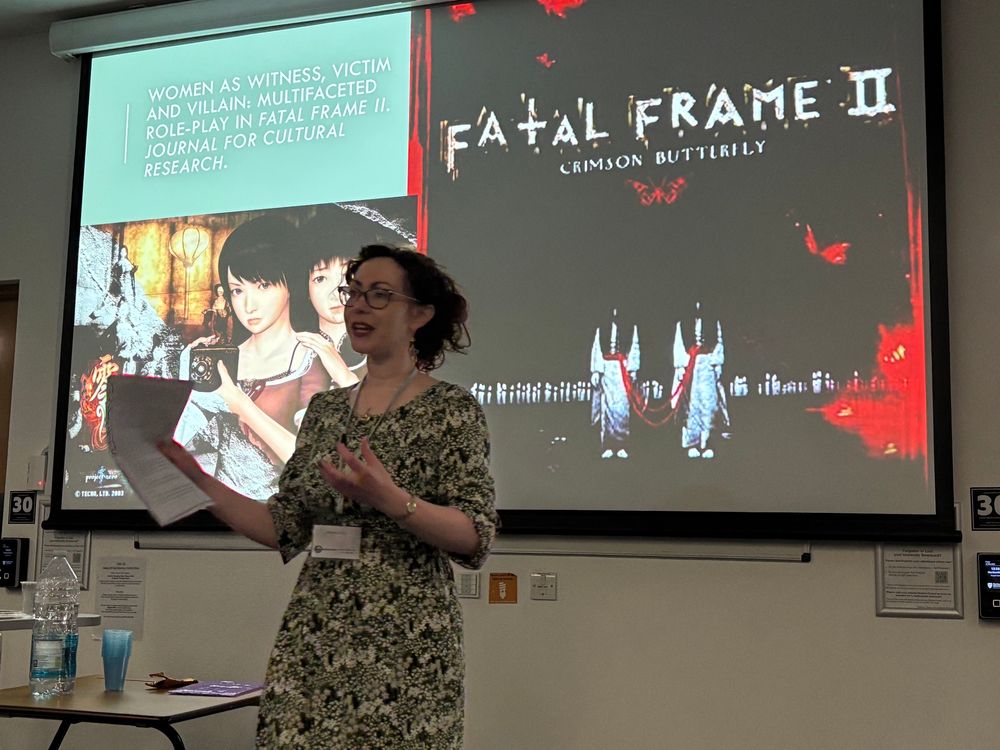 Woman giving lecture in front of screen