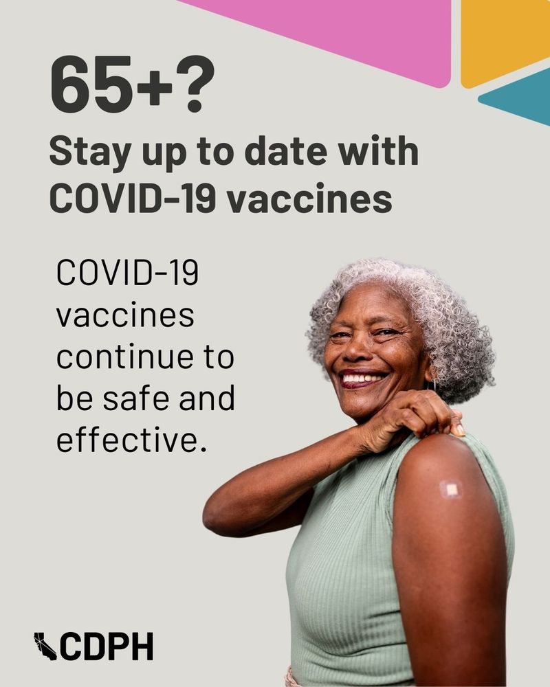 Promotional poster by CDPH encouraging individuals 65 and older to stay updated with COVID-19 vaccines, featuring a smiling older adult woman showing the bandage on her arm where vaccinated.