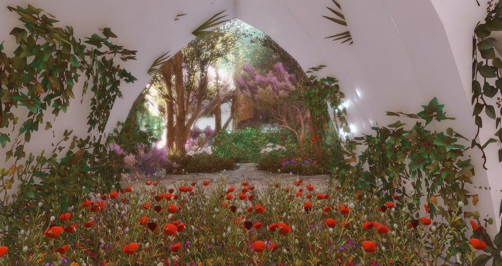 A flower field leading to a little forest enclave, with a waterfall near by. 