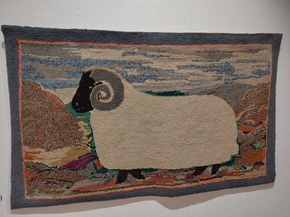 Rug featuring a ram