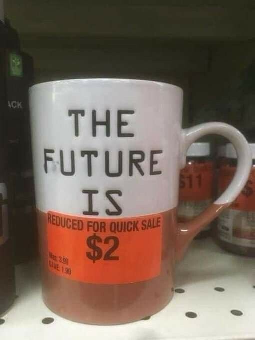 Mug with “the future is” and a sticker over the rest saying “reduced for quick sale $2”