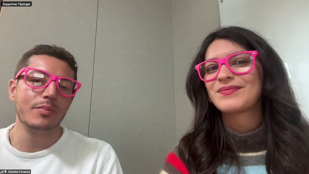 Both are wearing pink glasses